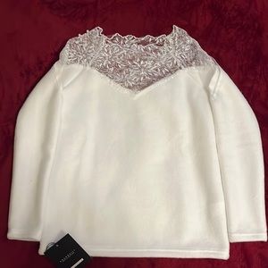 NEW with tags white sweater. Women’s small. Lace and pearl embellished neckline.